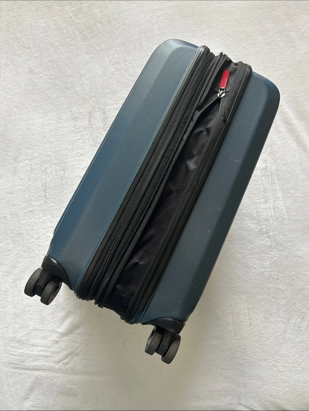 Ricardo Navy Blue Carry-On Spinner Luggage